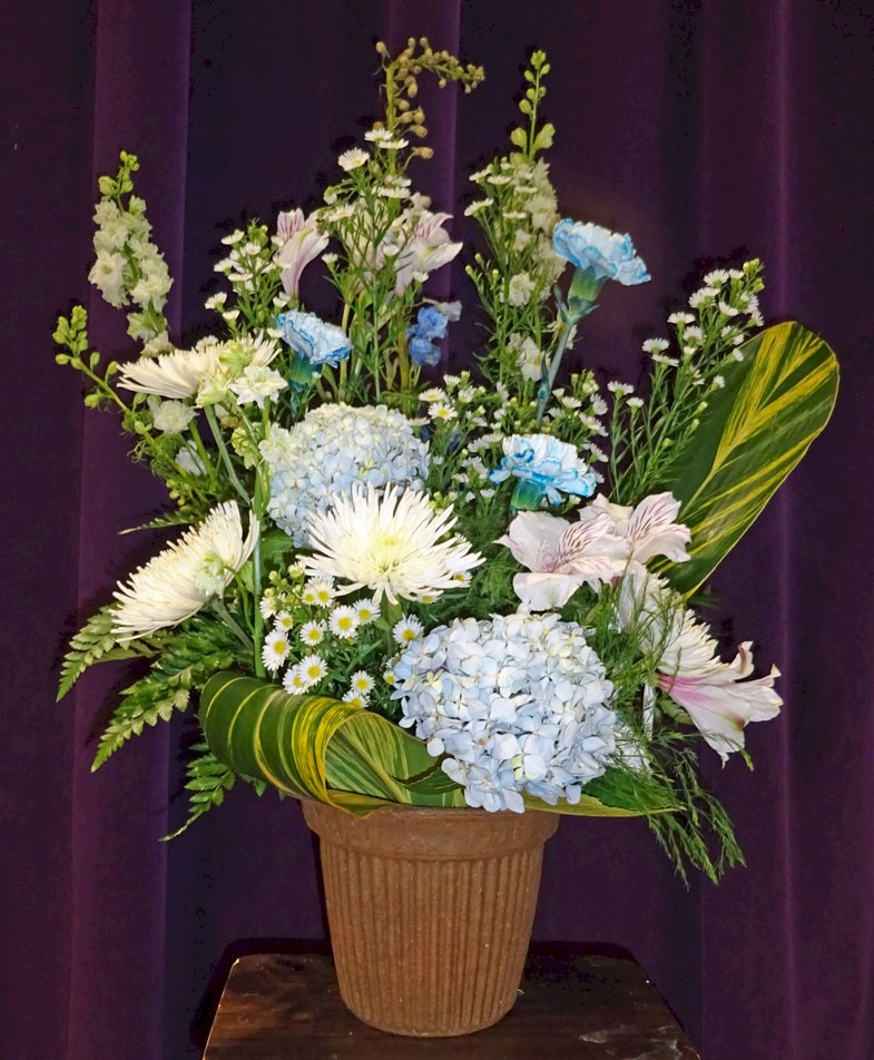 Flowers from Dick & Darlene Muth and Muth Electric Inc.