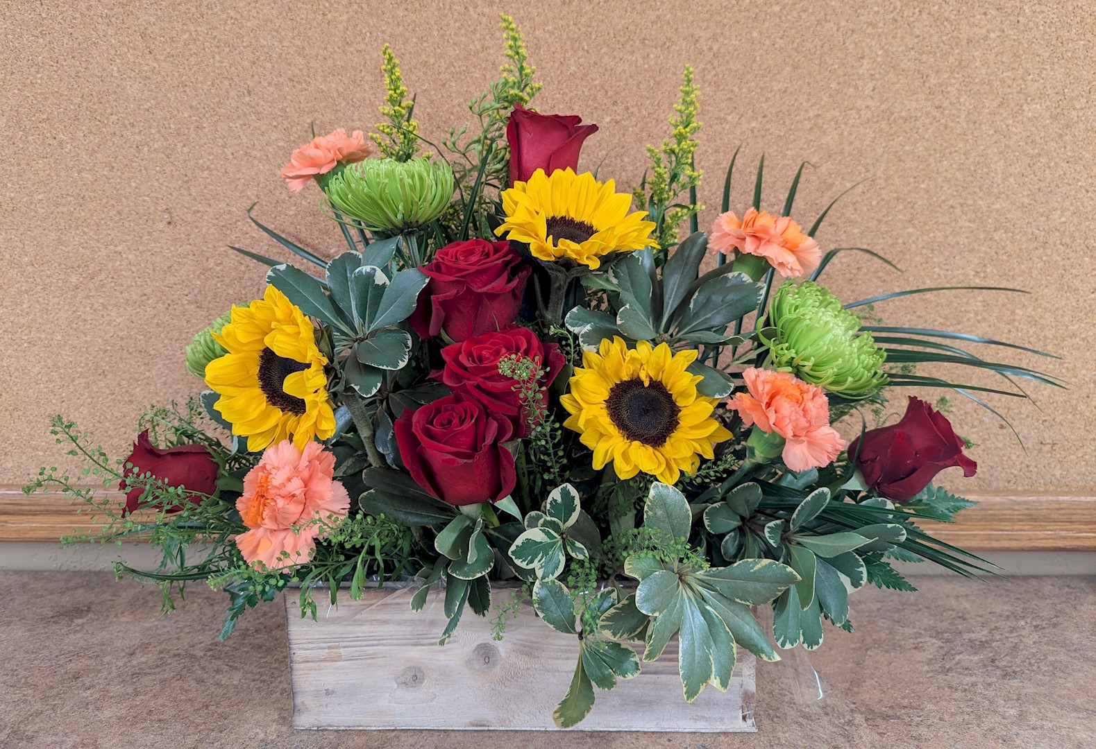 Flowers from Erin Logan; Amy Houge; Julie Daly; and Jenna Finn