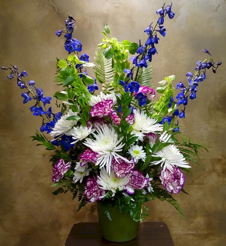 Flowers from Randy & Bessie Neville, the Cave Family, the McKnight Family, and the Johnson Family