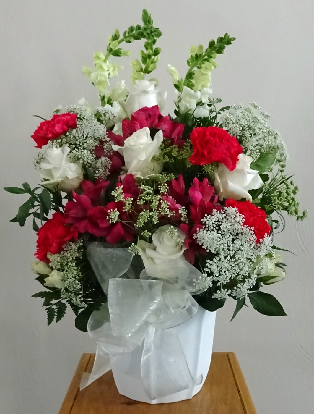 Flowers from Norman & Jean Amiotte, Eddie Amiotte & Girls, and Ken & Julie Bartlett and Family