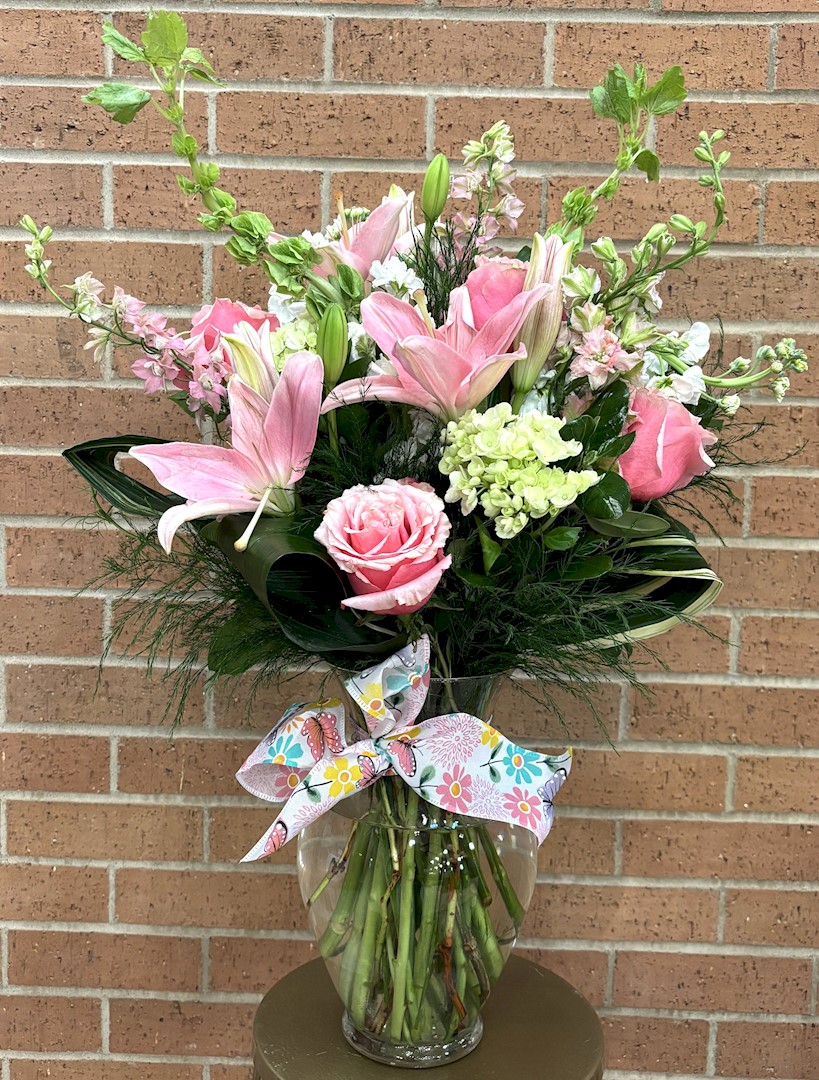 Flowers from Joan Paulsen and Family and Twila and Elmer Koopman and Family