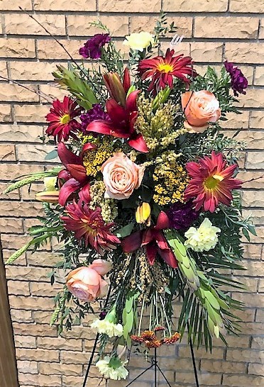 Flowers from Mark and Vickie; Tim, Tara, and Family; Reed, Jenn, and Family; and Jess, Tony, and Family