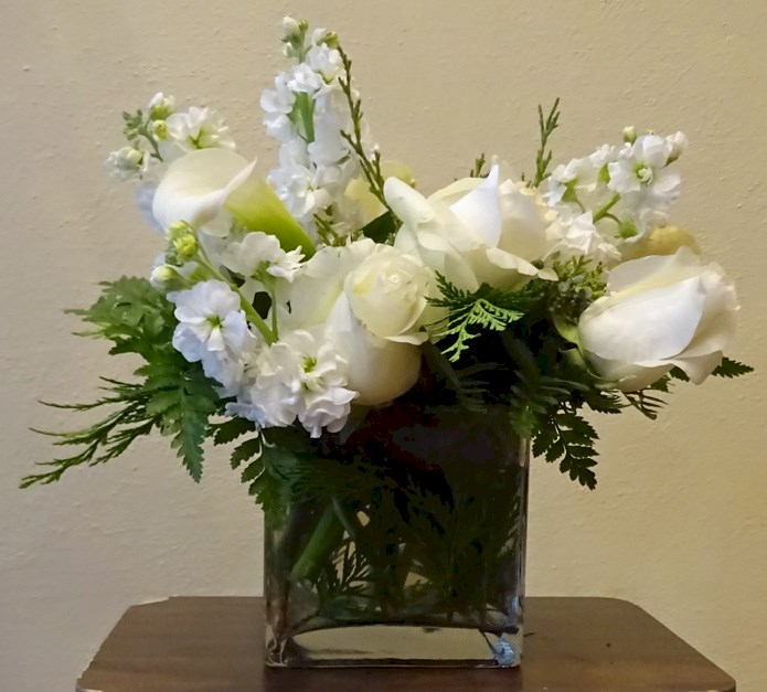 Flowers from Kim & Family, Ryan, Brian & Family, and Rob