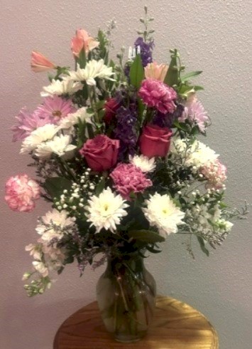 Flowers from Cletus and Irene; Veryl and Juanita; Rosemary, Cathy, and Dan; and Terry, nieces, and nephews