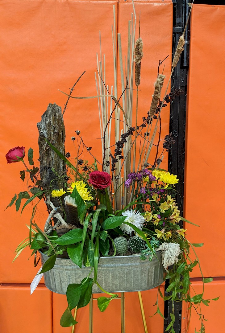 Flowers from Gordon and Trudy Flesner; Kurt, Katie, and Sarah Flesner and Families; John and Samantha Addison Family; and Seth and Sherrill Thomson Family