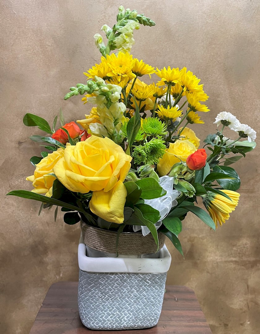 Flowers from John and Carol; Doug and Krista; Julie and Chad; Andy and Sam; and Families