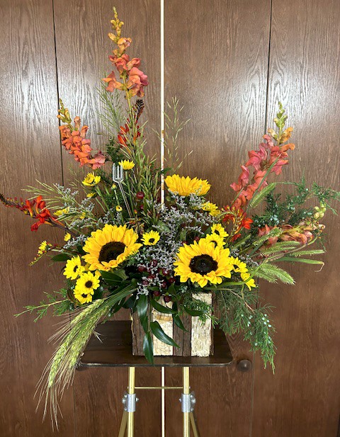 Flowers from Marv and Norma; Travis and Families; Keilani and Family; Laine and Mike; and Mindy and Family