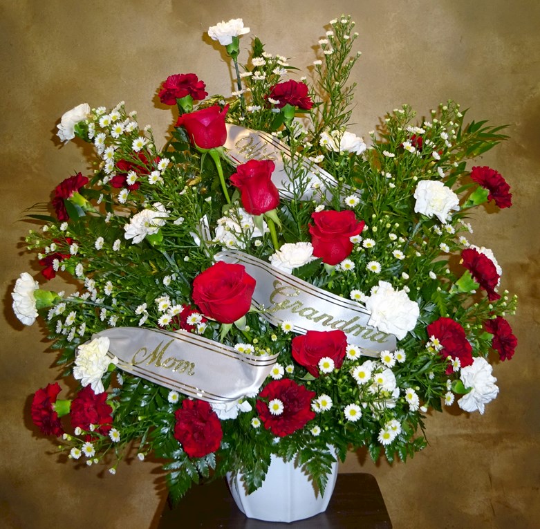 Flowers from "Wife" "Grandma" "Mom"