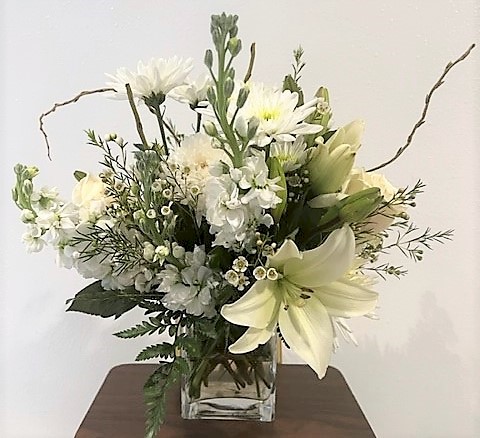 Flowers from John Petrik, Wendy VanBeck, Lori Colbeck, and Families