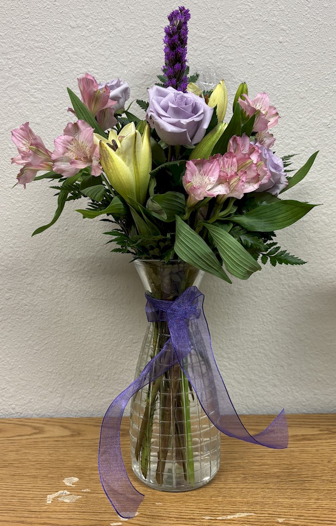 Flowers from Merlin and Megan Bennett and Family