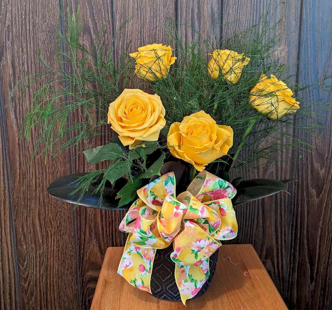 Flowers from The Larsons: Ann, Kathy, and Family; Greg and Family; and Ronnie and Family