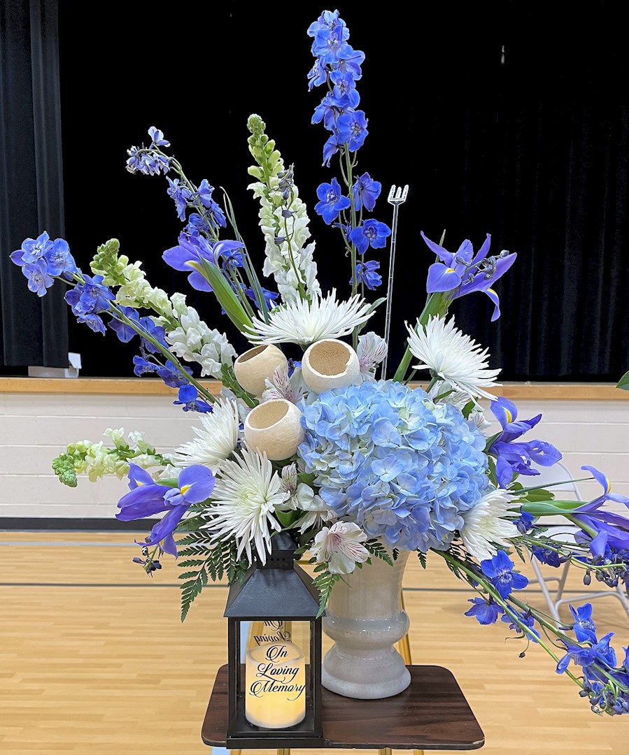 Flowers from Debbie Eisenbraun; Phil and Johnita Stapleton; Kelly and Chaney Boomer; Scott and Laci Varilek; and Families