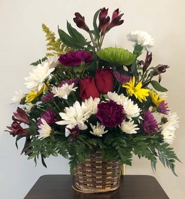 Flowers from Evelyn Daum, Darrell and Pam Daum, and Ken and Jane Daum