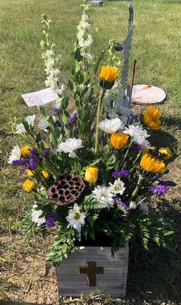 Flowers from Gwen and Melanie; Lloyd and Jean Estes; and Jim and Sandy
