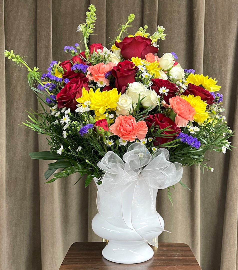 Flowers from Karl and Val Schulz/ Kyle and Bailey Schulz; Andy and Brianna Schulz and Family; Andy and Heather Weisser and Family; Eben and Stephanie; and Rossouw and Family