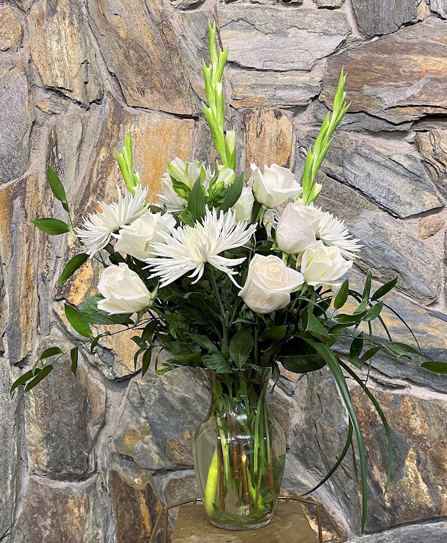Flowers from Pat, Tim, Mike, Brian, Chris, Dan, and Families