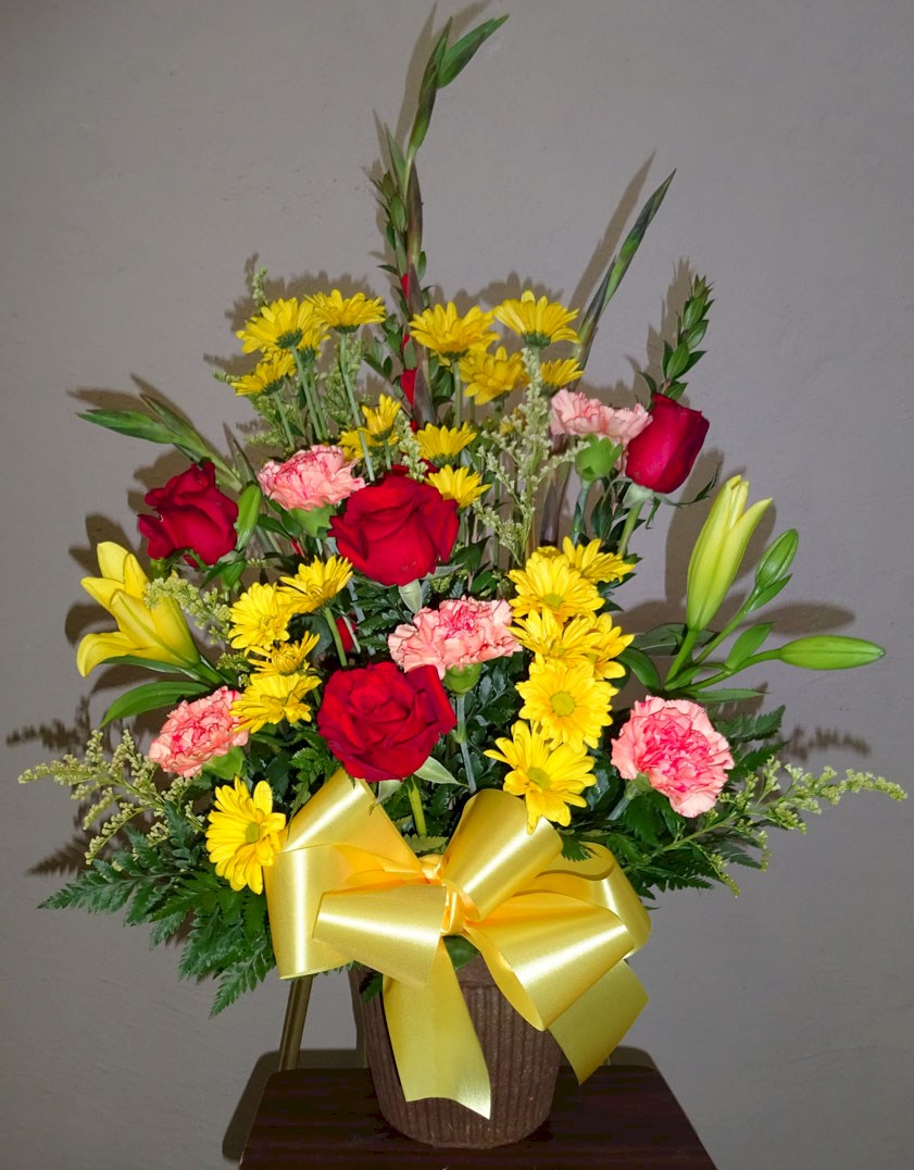 Flowers from Jim and Kathy Rock, Brandon, Sanna, and Family, Brice and Family, and Bailey, Preston, and Family
