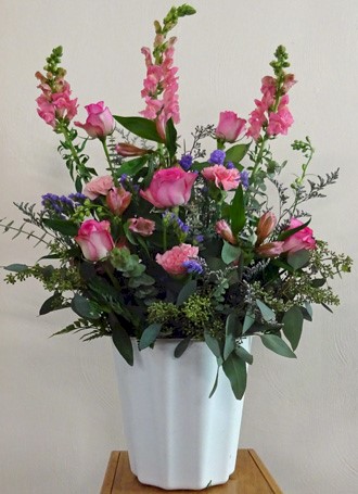 Flowers from Keith and Bunny Berry, Jim and Joni Hunt Family, Lawrence and Patricia Swicegood Family, and Steve and Bobbi Stanfill Family