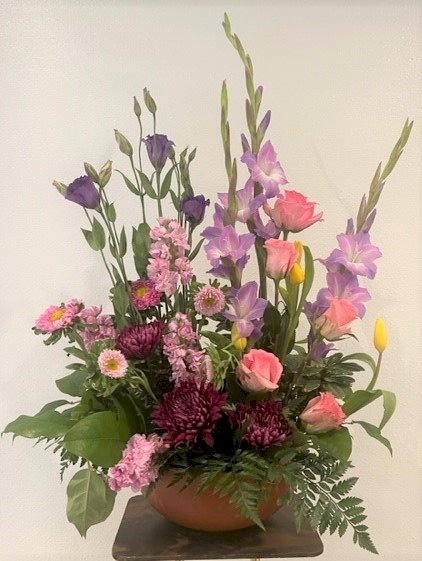 Flowers from Norma and Lowell's Family; Donna and Jim Hicks and Family; Jim and Jennifer Good and Family; Wayne and Donna Bond and Family; and Jayne and Mark Nivens and Family