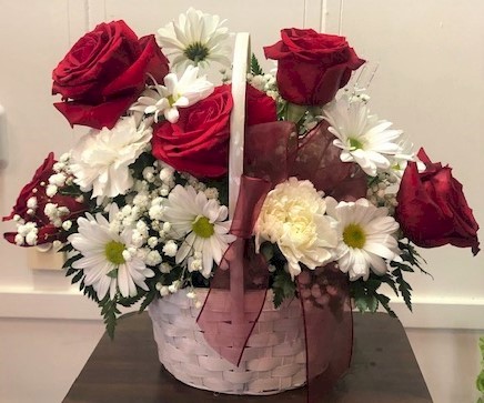Flowers from Linda Suess, Bob and Jayne Stotts, Kim and Dave Hicks, and Kayla Tucker