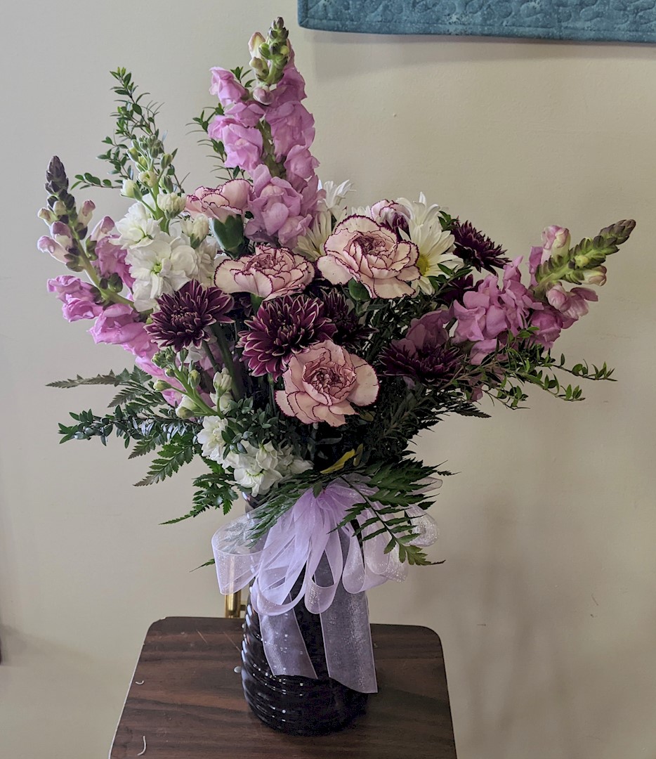 Flowers from Vernie, Justin, and Family; Boomer and Family; and Amber and Family