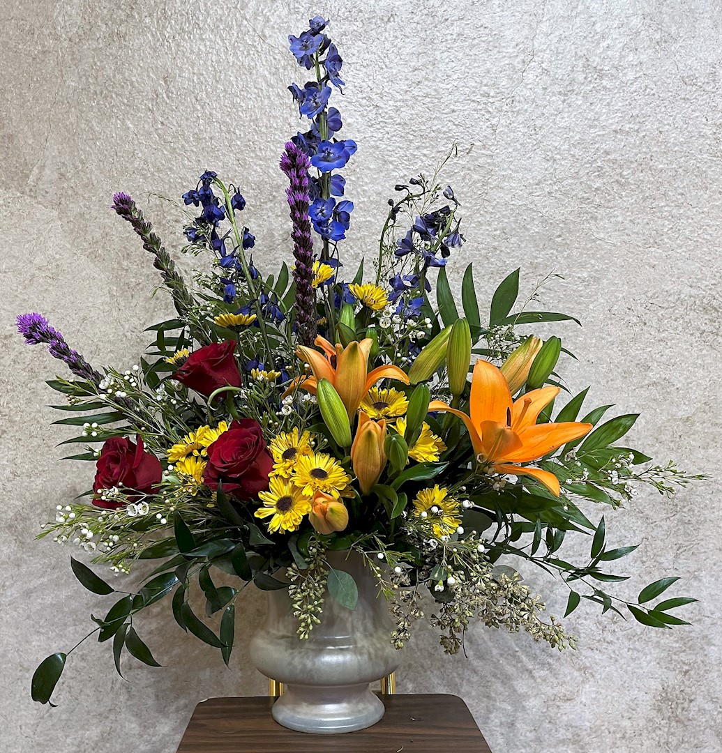 Flowers from Craig and Roxy Wollmann; Ian, Liz, and Family; and Kyle, Katie, and Family