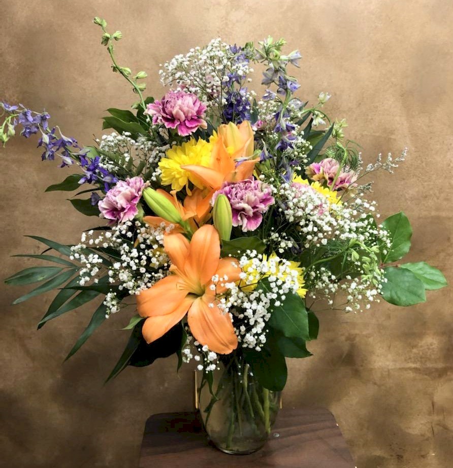 Flowers from Joanne, Boyd, & Kara; Wade, Marcy, and Family; Heath, Andi, and Family; and Eric, Kayla, and Family