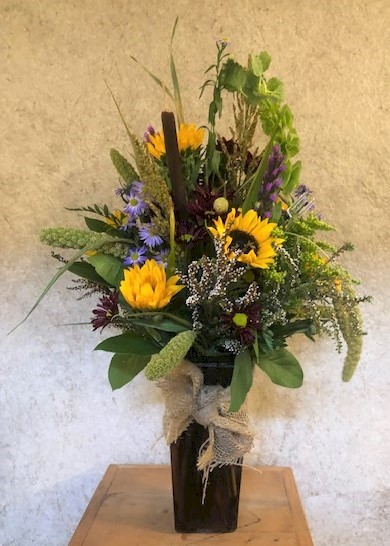 Flowers from Dick and Judy Thompson and Sharon Johnson