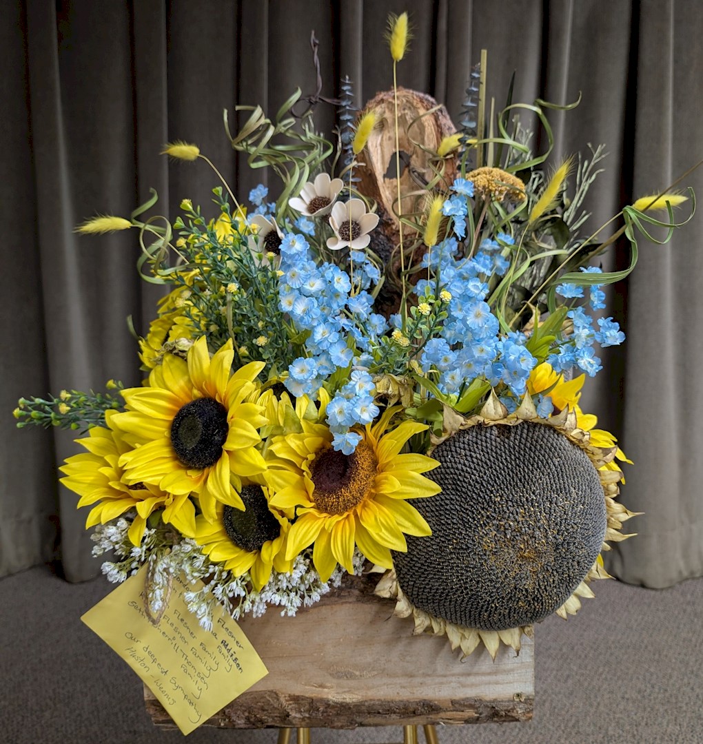 Flowers from Gordon and Trudy Flesner; John and Samantha Addison Family; Sarah Flesner Family; Katie Flesner Family; and Seth and Sherrill Thomsen Family