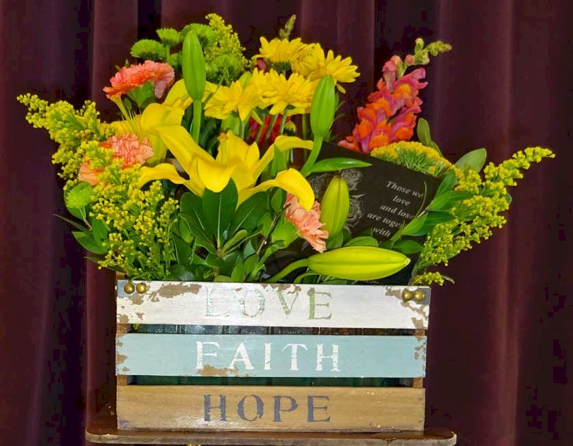 Flowers from Gregg, Janelle, Carson, Addison, and Tyson
