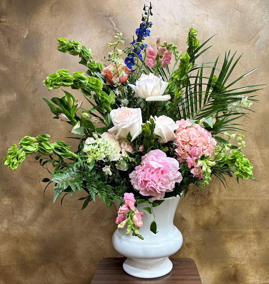 Flowers from Dennis and Bryan Hanson; Mike and Marilyn Long; Doyle and Barb Melgaard; and Families