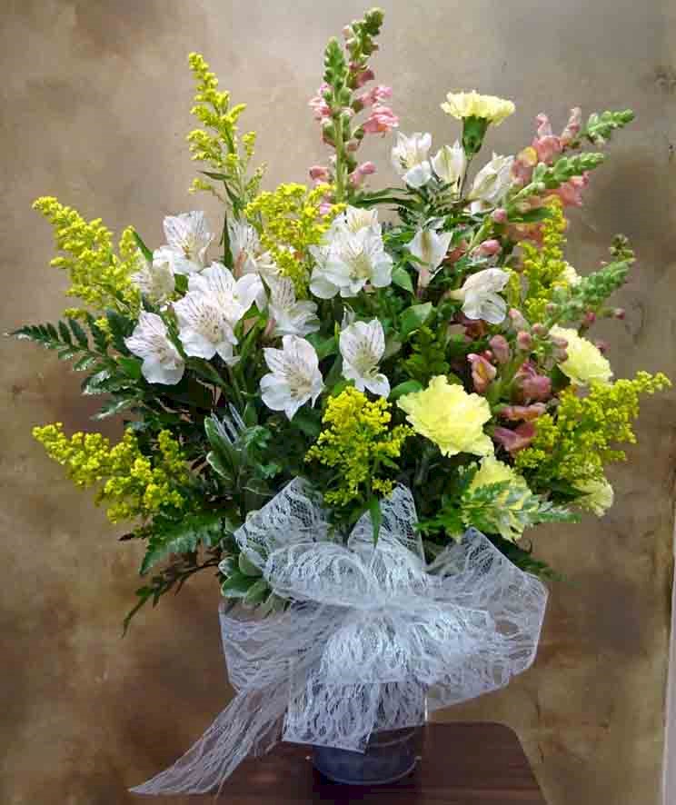Flowers from Dwight, Marie, Emma, Sayde, Jared, Ryan, and Lesley