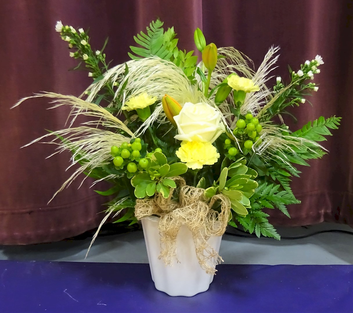 Flowers from Delores Holmes; Tom and Kathy Holmes; Doug and JoAnn Holmes; Patsy and Scott Carey; and all Families